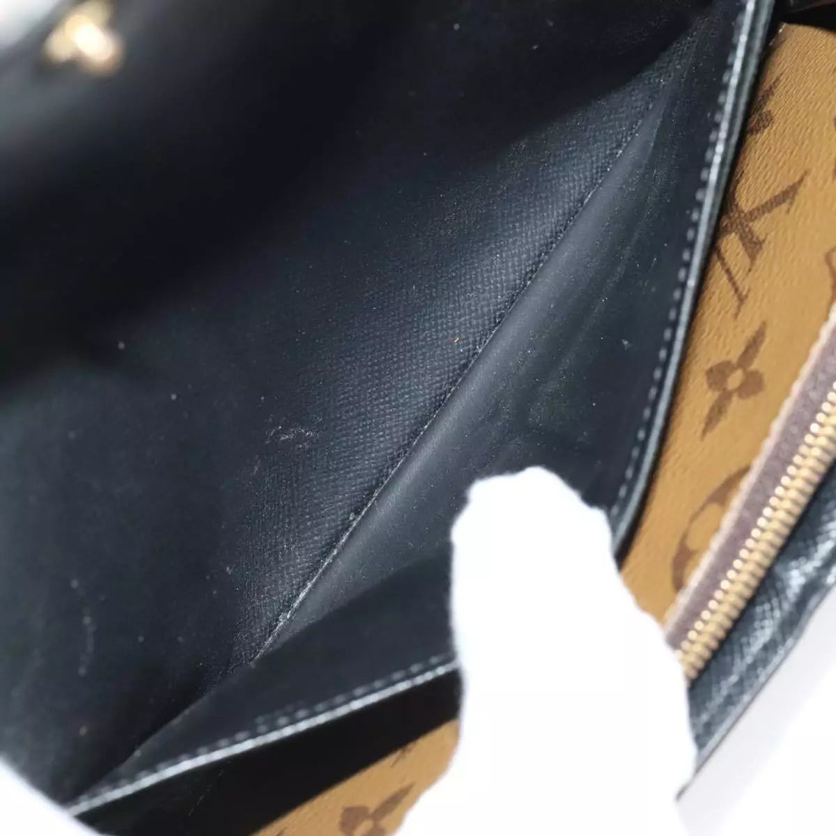 LOUIS VUITTON Monogram Reverse Giant Portefeuille Sarah Wallet